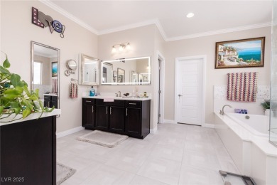This impressive two-story home is nestled in the prestigious on Rhodes Ranch Golf Club in Nevada - for sale on GolfHomes.com, golf home, golf lot