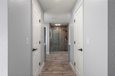 Soft views of surrounding trees create a tranquil backdrop for on Bobcat Trail Golf Club in Florida - for sale on GolfHomes.com, golf home, golf lot