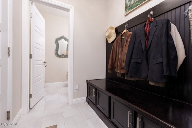 This impressive two-story home is nestled in the prestigious on Rhodes Ranch Golf Club in Nevada - for sale on GolfHomes.com, golf home, golf lot