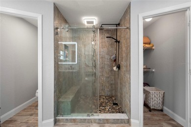 Soft views of surrounding trees create a tranquil backdrop for on Bobcat Trail Golf Club in Florida - for sale on GolfHomes.com, golf home, golf lot