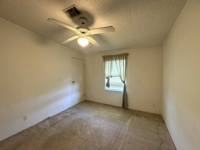 Here's a home that has enormous potential. Great open floor plan on The Meadows At Countrywood in Florida - for sale on GolfHomes.com, golf home, golf lot