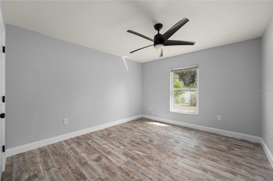 Soft views of surrounding trees create a tranquil backdrop for on Bobcat Trail Golf Club in Florida - for sale on GolfHomes.com, golf home, golf lot