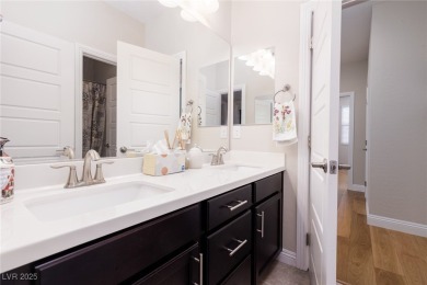 This impressive two-story home is nestled in the prestigious on Rhodes Ranch Golf Club in Nevada - for sale on GolfHomes.com, golf home, golf lot