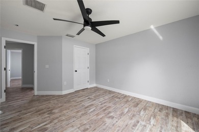 Soft views of surrounding trees create a tranquil backdrop for on Bobcat Trail Golf Club in Florida - for sale on GolfHomes.com, golf home, golf lot