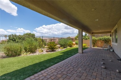 This impressive two-story home is nestled in the prestigious on Rhodes Ranch Golf Club in Nevada - for sale on GolfHomes.com, golf home, golf lot