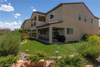 This impressive two-story home is nestled in the prestigious on Rhodes Ranch Golf Club in Nevada - for sale on GolfHomes.com, golf home, golf lot