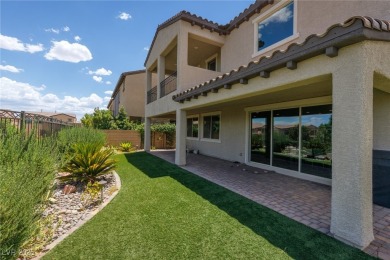 This impressive two-story home is nestled in the prestigious on Rhodes Ranch Golf Club in Nevada - for sale on GolfHomes.com, golf home, golf lot