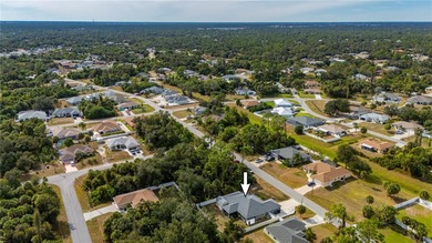 Soft views of surrounding trees create a tranquil backdrop for on Bobcat Trail Golf Club in Florida - for sale on GolfHomes.com, golf home, golf lot