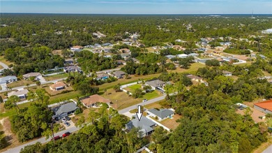 Soft views of surrounding trees create a tranquil backdrop for on Bobcat Trail Golf Club in Florida - for sale on GolfHomes.com, golf home, golf lot