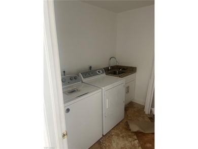 Eagle Creek is an established community with lush landscaping on Eagle Creek Golf and Country Club in Florida - for sale on GolfHomes.com, golf home, golf lot