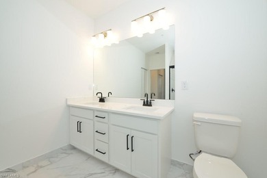 Welcome to Villa Mar Bonita Beach, a stunning gated coastal on Highland Woods Golf and Country Club in Florida - for sale on GolfHomes.com, golf home, golf lot