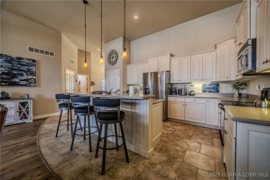 Waterfront Villa in a highly-desirable neighborhood community on Seasons Ridge At Four Seasons in Missouri - for sale on GolfHomes.com, golf home, golf lot