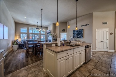 Waterfront Villa in a highly-desirable neighborhood community on Seasons Ridge At Four Seasons in Missouri - for sale on GolfHomes.com, golf home, golf lot