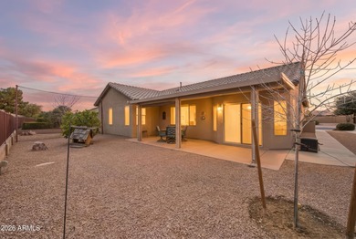 Morning light spills across manicured greens, greeting the day on Springfield Golf Resort in Arizona - for sale on GolfHomes.com, golf home, golf lot