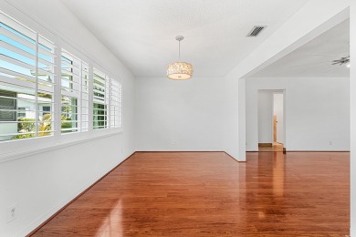 Nestled within 55+ Palm Beach Leisureville, this expanded on Leisureville Community Golf Course in Florida - for sale on GolfHomes.com, golf home, golf lot