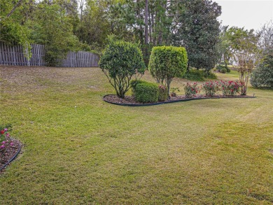 Fabulous Santa Rosa model boasts brick pavers on driveway and on Eagle Ridge At Spruce Creek Country Club in Florida - for sale on GolfHomes.com, golf home, golf lot