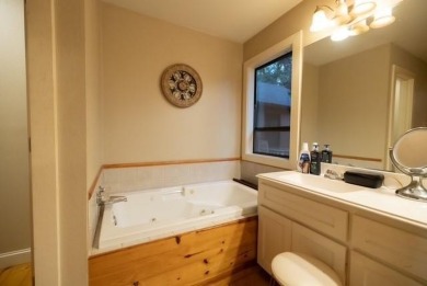 Welcome to this charming home nestled within the private, gated on Holly Lake Ranch Golf Club in Texas - for sale on GolfHomes.com, golf home, golf lot