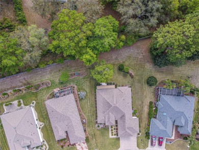 Fabulous Santa Rosa model boasts brick pavers on driveway and on Eagle Ridge At Spruce Creek Country Club in Florida - for sale on GolfHomes.com, golf home, golf lot