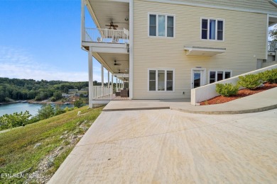 This modern 2-bedroom, 2.5-bathroom condo in Deerfield Resort on The Greens at Deerfield in Tennessee - for sale on GolfHomes.com, golf home, golf lot