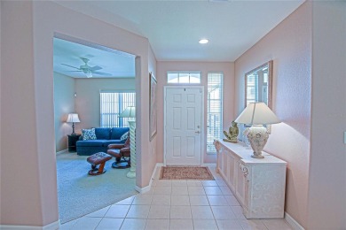 Fabulous Santa Rosa model boasts brick pavers on driveway and on Eagle Ridge At Spruce Creek Country Club in Florida - for sale on GolfHomes.com, golf home, golf lot
