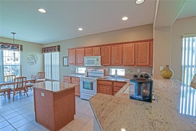 Fabulous Santa Rosa model boasts brick pavers on driveway and on Eagle Ridge At Spruce Creek Country Club in Florida - for sale on GolfHomes.com, golf home, golf lot