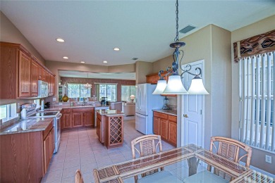 Fabulous Santa Rosa model boasts brick pavers on driveway and on Eagle Ridge At Spruce Creek Country Club in Florida - for sale on GolfHomes.com, golf home, golf lot