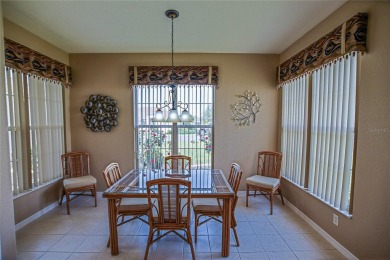Fabulous Santa Rosa model boasts brick pavers on driveway and on Eagle Ridge At Spruce Creek Country Club in Florida - for sale on GolfHomes.com, golf home, golf lot
