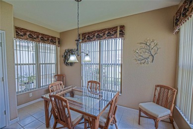 Fabulous Santa Rosa model boasts brick pavers on driveway and on Eagle Ridge At Spruce Creek Country Club in Florida - for sale on GolfHomes.com, golf home, golf lot