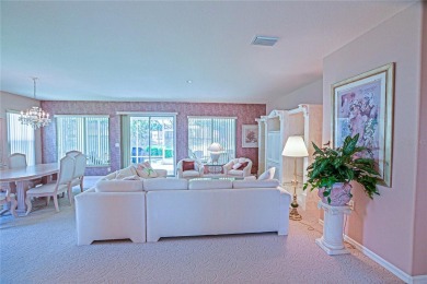 Fabulous Santa Rosa model boasts brick pavers on driveway and on Eagle Ridge At Spruce Creek Country Club in Florida - for sale on GolfHomes.com, golf home, golf lot