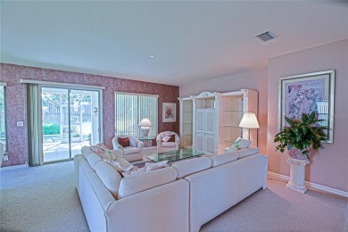 Fabulous Santa Rosa model boasts brick pavers on driveway and on Eagle Ridge At Spruce Creek Country Club in Florida - for sale on GolfHomes.com, golf home, golf lot