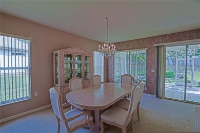 Fabulous Santa Rosa model boasts brick pavers on driveway and on Eagle Ridge At Spruce Creek Country Club in Florida - for sale on GolfHomes.com, golf home, golf lot