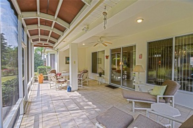 Fabulous Santa Rosa model boasts brick pavers on driveway and on Eagle Ridge At Spruce Creek Country Club in Florida - for sale on GolfHomes.com, golf home, golf lot