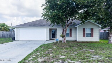 Discover coastal living at its finest in this charming, updated on Holiday Golf Club in Florida - for sale on GolfHomes.com, golf home, golf lot