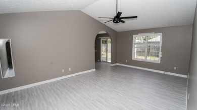 Discover coastal living at its finest in this charming, updated on Holiday Golf Club in Florida - for sale on GolfHomes.com, golf home, golf lot