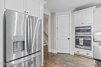 Located on a private lot backing to a serene, wooded preserve on Cape Fear National At Brunswick Forest in North Carolina - for sale on GolfHomes.com, golf home, golf lot