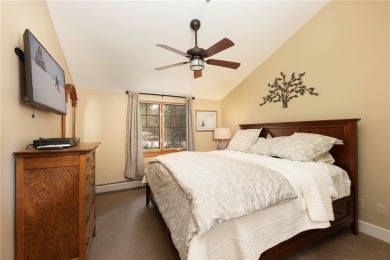 Rare 4-bedroom end unit townhome with warm wood accents and a on The River Course At Keystone in Colorado - for sale on GolfHomes.com, golf home, golf lot