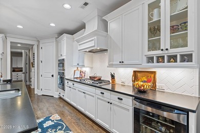 Located on a private lot backing to a serene, wooded preserve on Cape Fear National At Brunswick Forest in North Carolina - for sale on GolfHomes.com, golf home, golf lot