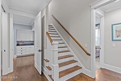 Located on a private lot backing to a serene, wooded preserve on Cape Fear National At Brunswick Forest in North Carolina - for sale on GolfHomes.com, golf home, golf lot