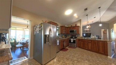 Stunning home, beautiful open floor plan, located in the quiet on Ocala Palms Golf and Country Club in Florida - for sale on GolfHomes.com, golf home, golf lot