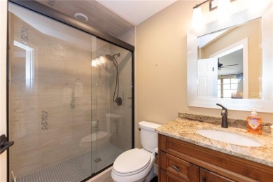 Rare 4-bedroom end unit townhome with warm wood accents and a on The River Course At Keystone in Colorado - for sale on GolfHomes.com, golf home, golf lot