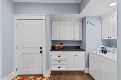 Located on a private lot backing to a serene, wooded preserve on Cape Fear National At Brunswick Forest in North Carolina - for sale on GolfHomes.com, golf home, golf lot