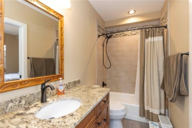 Rare 4-bedroom end unit townhome with warm wood accents and a on The River Course At Keystone in Colorado - for sale on GolfHomes.com, golf home, golf lot