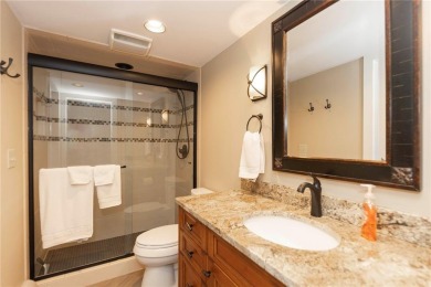 Rare 4-bedroom end unit townhome with warm wood accents and a on The River Course At Keystone in Colorado - for sale on GolfHomes.com, golf home, golf lot
