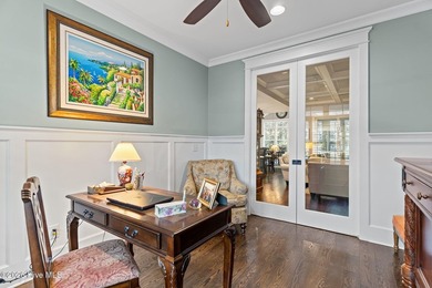 Located on a private lot backing to a serene, wooded preserve on Cape Fear National At Brunswick Forest in North Carolina - for sale on GolfHomes.com, golf home, golf lot