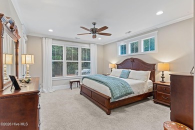 Located on a private lot backing to a serene, wooded preserve on Cape Fear National At Brunswick Forest in North Carolina - for sale on GolfHomes.com, golf home, golf lot