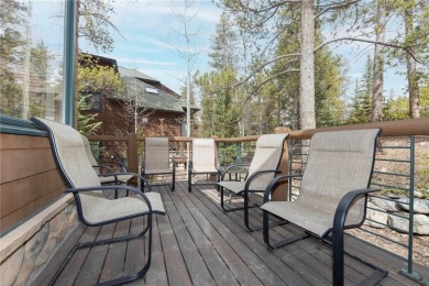 Rare 4-bedroom end unit townhome with warm wood accents and a on The River Course At Keystone in Colorado - for sale on GolfHomes.com, golf home, golf lot