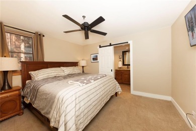 Rare 4-bedroom end unit townhome with warm wood accents and a on The River Course At Keystone in Colorado - for sale on GolfHomes.com, golf home, golf lot