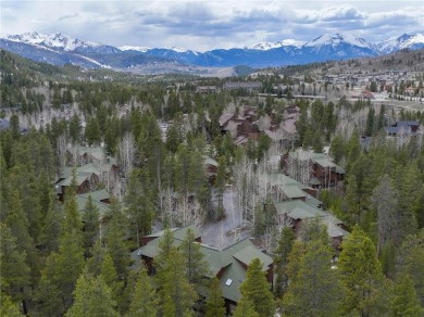 Rare 4-bedroom end unit townhome with warm wood accents and a on The River Course At Keystone in Colorado - for sale on GolfHomes.com, golf home, golf lot