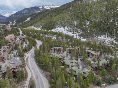 Rare 4-bedroom end unit townhome with warm wood accents and a on The River Course At Keystone in Colorado - for sale on GolfHomes.com, golf home, golf lot