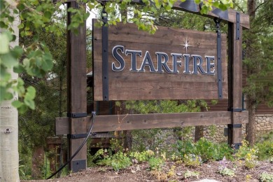 Rare 4-bedroom end unit townhome with warm wood accents and a on The River Course At Keystone in Colorado - for sale on GolfHomes.com, golf home, golf lot